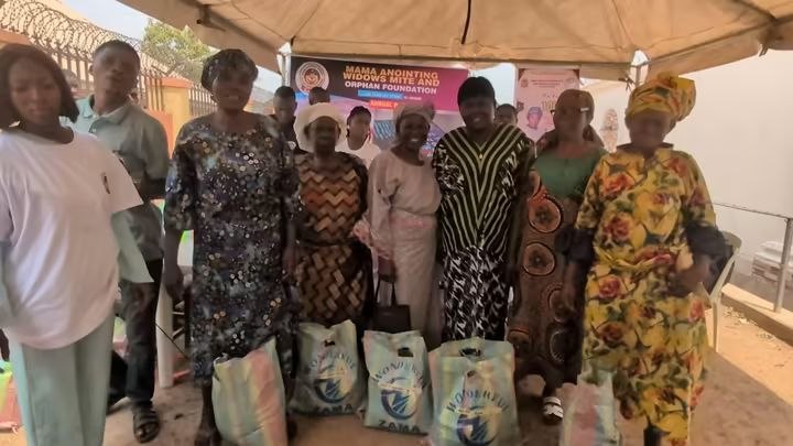 Foundation volunteers and community members gathered with distributed support bags